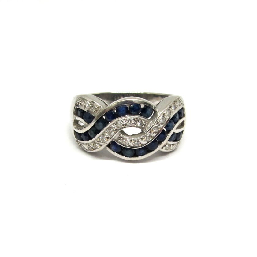 Sortija oro blanco entrelazado con diamantes y zafiros